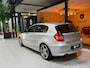 BMW 1-Serie 118i Automaat|Leder|Xenon|18'' Sportvelgen|Trekhaak|Cruise|Clima|PDC|Rijklaar