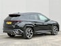 Hyundai Tucson 1.6 T-GDI PHEV N Line Sky 4WD / Facelift / Fabrieksgarantie tot 12-2029 / Dealer onderhouden / Panorama schuifdak / Navigatie / Camera / Elektrische Achterklep / Stuur & Stoelverwarming / Apple Carplay Android / 19" LM wielen /