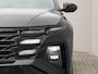 Hyundai Tucson 1.6 T-GDI PHEV N Line Sky 4WD / Facelift / Fabrieksgarantie tot 12-2029 / Dealer onderhouden / Panorama schuifdak / Navigatie / Camera / Elektrische Achterklep / Stuur & Stoelverwarming / Apple Carplay Android / 19" LM wielen /