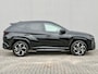 Hyundai Tucson 1.6 T-GDI PHEV N Line Sky 4WD / Facelift / Fabrieksgarantie tot 12-2029 / Dealer onderhouden / Panorama schuifdak / Navigatie / Camera / Elektrische Achterklep / Stuur & Stoelverwarming / Apple Carplay Android / 19" LM wielen /