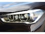 BMW X1 sDrive20i High Executive * Sportstoelen * Panoramadak * Achteruitrijcamera * Trekhaak * Head-up *