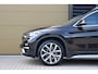 BMW X1 sDrive20i High Executive * Sportstoelen * Panoramadak * Achteruitrijcamera * Trekhaak * Head-up *