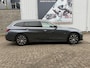 BMW 3-Serie 320e Touring Business Edition Plus 204 Pk |Navigatie | Cruise | Panoramadak | Camera | 17".