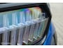 Skoda Enyaq iV 80 Sportline | Chrystal lights and face | ACC | Elec. Trekhaak | Racing Blue | 90% SOH | Camera | Sfeerverlichting | 21 Inch | Memory | CarPlay | Stoel en stuurwielverw.