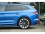 Skoda Enyaq iV 80 Sportline | Chrystal lights and face | ACC | Elec. Trekhaak | Racing Blue | 90% SOH | Camera | Sfeerverlichting | 21 Inch | Memory | CarPlay | Stoel en stuurwielverw.