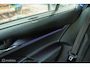 Skoda Enyaq iV 80 Sportline | Chrystal lights and face | ACC | Elec. Trekhaak | Racing Blue | 90% SOH | Camera | Sfeerverlichting | 21 Inch | Memory | CarPlay | Stoel en stuurwielverw.