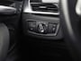 BMW X1 sDrive18i Sport High Executive 140Pk Automaat (PANORAMADAK, GROOT NAVI, MEMORY SEAT, LEDER, CAMERA, SPORTSTOELEN, TREKHAAK, STOELVERWARMING, NIEUWSTAAT)