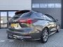 Ford Focus Wagon 1.0 EcoBoost Hybrid ST Line X ✓Automaat ✓Rijklaar ✓Virtual Cockpit ✓Full LED ✓Navigatie ✓Camera ✓Apple Carplay & Android Auto ✓Adaptive Cruise ✓Climate ✓Elektrische Trekhaak