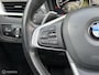 BMW X1 xDrive20i Xline Panodak Navi Carplay Memory Leer Camera Harman Kardon Trekhaak