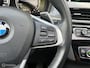BMW X1 xDrive20i Xline Panodak Navi Carplay Memory Leer Camera Harman Kardon Trekhaak