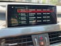 BMW X1 xDrive20i Xline Panodak Navi Carplay Memory Leer Camera Harman Kardon Trekhaak