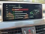BMW X1 xDrive20i Xline Panodak Navi Carplay Memory Leer Camera Harman Kardon Trekhaak