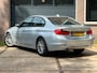BMW 3-Serie 316i Sport Automaat | Keyless Entry | Navigatie | Stoelverwarming | Climate Control| Parkeerhulp V+A |