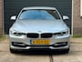 BMW 3-Serie 316i Sport Automaat | Keyless Entry | Navigatie | Stoelverwarming | Climate Control| Parkeerhulp V+A |