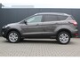Ford Kuga 1.5 Titanium | Incl. 12 maanden garantie | Voorstoelen verwarmd | Verwarmd stuurwiel | Voorruit verwarming | Bluetooth | DAB | Climate control | Cruise control | Elektrische achterklep | Lichtmetalen velgen