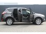 Ford Kuga 1.5 Titanium | Incl. 12 maanden garantie | Voorstoelen verwarmd | Verwarmd stuurwiel | Voorruit verwarming | Bluetooth | DAB | Climate control | Cruise control | Elektrische achterklep | Lichtmetalen velgen