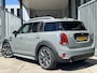 MINI Countryman 1.5 Cooper S E ALL4 Chili | AUTOMAAT | HEAD-UP DISPLAY | LEDER | SCHUIF/KANTELDAK | CARPLAY | HARMAN/KARDON | CAMERA | NAVI | CRUISE CONTROL ADAPTIEF | PDC V+A | CLIMATE CONTROL | LMV 19'' | STOELVERWARMING | KEYLESS | LED | DAB | BLUETOOTH