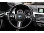 BMW X1 xDrive20i High Exe. M Sport 70.615 km! / Panoramadak / Camera / Head-up / Leder / Navigatie / 18'' / Stuur+Stoelverwarming / Cruise Control