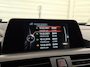 BMW 1-Serie 120i Centennial Executive|184PK|ECC|PANO|CRUISE|BLUETOOTH|TREKHAAK|NAVI