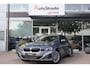 BMW 3-Serie (g20) 320e High Executive 204pk | Curved Display I Leder | Camera I Climate I Carplay I DAB I