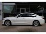 BMW 3-Serie (g20) 320e High Executive 204pk | SoH 97% | Curved Display I Leder | Camera I Climate I Carplay I DAB I