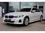 BMW 3-Serie (g20) 320e High Executive 204pk | SoH 97% | Curved Display I Leder | Camera I Climate I Carplay I DAB I