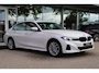 BMW 3-Serie (g20) 320e High Executive 204pk | SoH 97% | Curved Display I Leder | Camera I Climate I Carplay I DAB I