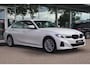 BMW 3-Serie (g20) 320e High Executive 204pk | Curved Display I Leder | Camera I Climate I Carplay I DAB I