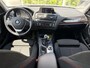 BMW 1-Serie 114i EDE Business Sport 100pk | Airco automatisch | Bi-xenon koplampen | Cruise control | Dab | Lichtmetalen velgen 16" | Navigatiesysteem full map | Parkeersensor achter | Dealer onderhouden!