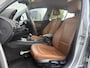 BMW 1-Serie 118i Business Line 143pk | Airco automatisch | Cruise control | Lederen bekleding | Lichtmetalen velgen 16" | Multimedia systeem | Navigatiesysteem | Radio cd speler | Rijdt perfect!