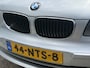 BMW 1-Serie 118i Business Line 143pk | Airco automatisch | Cruise control | Lederen bekleding | Lichtmetalen velgen 16" | Multimedia systeem | Navigatiesysteem | Radio cd speler | Rijdt perfect!