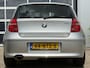 BMW 1-Serie 118i Business Line 143pk | Airco automatisch | Cruise control | Lederen bekleding | Lichtmetalen velgen 16" | Multimedia systeem | Navigatiesysteem | Radio cd speler | Rijdt perfect!