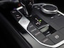 BMW 1-Serie 118i M Sport Automaat (PANORAMADAK, M PAKKET, DEALER ONDERHOUDEN, STUUR/STOELVERWARMING, CAMERA, BRUIN LEDER, SPOILER, BLACK PACK, SFEERVERLICHTING, NIEUWSTAAT)