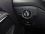 Mercedes-Benz A-klasse 180 AMG Sport Automaat (NAVIGATIE, LEDER, STOELVERWARMING, SPORTSTOELEN, ZWART HEMEL, PARKEERSENSOREN, TREKHAAK, CRUISE, NIEUWSTAAT)