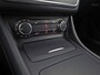 Mercedes-Benz A-klasse 180 AMG Sport Automaat (NAVIGATIE, LEDER, STOELVERWARMING, SPORTSTOELEN, ZWART HEMEL, PARKEERSENSOREN, TREKHAAK, CRUISE, NIEUWSTAAT)