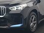 BMW iX1 xDrive30 67 kWh 313pk Dealer O.H. | Trekhaak Af Fabriek | Camera | Adaptief M Onderstel | Voorstoelen Verwarmd | Blis | Keyless | Apple Carplay | Adaptive LED | Sfeerverlichting | Widescreen Navi | DAB |