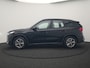 BMW iX1 xDrive30 67 kWh 313pk Dealer O.H. | Trekhaak Af Fabriek | Camera | Adaptief M Onderstel | Voorstoelen Verwarmd | Blis | Keyless | Apple Carplay | Adaptive LED | Sfeerverlichting | Widescreen Navi | DAB |
