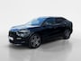 Ford Capri Premium Standard Range RWD 52 kWh | Uit Voorraad Leverbaar | €3.500,- Ready Set Ford Bonus | 374km WLTP Rijbereik | Warmtepomp | Draadloze Apple Carplay & Android Auto | B&O Premium Audio | Verwarmbare Voorstoelen | Adaptieve Cruise Control