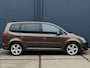 Volkswagen Touran 1.4 TSI Highline AUTOMAAT - SCOOTMOBIEL LIFT - ERGONOMISCHE BESTUURDERSSTOEL - TREKHAAK - CAMERA - NAVI - ECC - STOELVERWARMING - PDC - CRUISE CONTROLE - APK T/M 02-07-2027 -