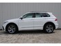 Volkswagen Tiguan 1.4 TSI eHybrid R-Line Business+ | Incl. 12 maanden garantie | SOH 92% | Stoel/stuurverwarming | Parkeercamera | Wegklapbare trekhaak | DAB radio | Apple carplay/Android auto | 100% dealer onderhouden |