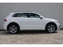 Volkswagen Tiguan 1.4 TSI eHybrid R-Line Business+ | Incl. 12 maanden garantie | SOH 92% | Stoel/stuurverwarming | Parkeercamera | Wegklapbare trekhaak | DAB radio | Apple carplay/Android auto | 100% dealer onderhouden |