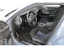 BMW 1-Serie 118i High Executive M-sport | Incl. 12 maanden garantie | Cruise control | Kuipstoelen | Schuif/kantel dak | Climate control | Apple carplay | Navigatie | DAB radio | Harman/Kardon |