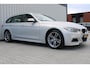 BMW 3-Serie Touring 316i High Executive | Incl. 12 maanden garantie | Cruise control | Climate control | Memory seat | Stoelverwarming | Navigatie | Lederen bekleding |