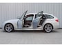BMW 3-Serie Touring 316i High Executive | Incl. 12 maanden garantie | Cruise control | Climate control | Memory seat | Stoelverwarming | Navigatie | Lederen bekleding |
