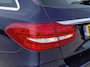 Mercedes-Benz C-klasse Estate 180 Business Solution AMG | Incl. 12 maanden garantie | Lederen sportstoelen | Cruise control | Climate control | Trekhaak | Zwarte hemel | LED Koplampen | 18" LM | Elektrische achterklep | Achteruitrijcamera | Dodehoek detectie |