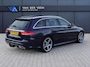 Mercedes-Benz C-klasse Estate 180 Business Solution AMG | Incl. 12 maanden garantie | Lederen sportstoelen | Cruise control | Climate control | Trekhaak | Zwarte hemel | LED Koplampen | 18" LM | Elektrische achterklep | Achteruitrijcamera | Dodehoek detectie |