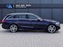 Mercedes-Benz C-klasse Estate 180 Business Solution AMG | Incl. 12 maanden garantie | Lederen sportstoelen | Cruise control | Climate control | Trekhaak | Zwarte hemel | LED Koplampen | 18" LM | Elektrische achterklep | Achteruitrijcamera | Dodehoek detectie |