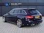 Mercedes-Benz C-klasse Estate 180 Business Solution AMG | Incl. 12 maanden garantie | Lederen sportstoelen | Cruise control | Climate control | Trekhaak | Zwarte hemel | LED Koplampen | 18" LM | Elektrische achterklep | Achteruitrijcamera | Dodehoek detectie |