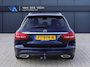 Mercedes-Benz C-klasse Estate 180 Business Solution AMG | Incl. 12 maanden garantie | Lederen sportstoelen | Cruise control | Climate control | Trekhaak | Zwarte hemel | LED Koplampen | 18" LM | Elektrische achterklep | Achteruitrijcamera | Dodehoek detectie |