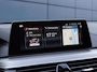 BMW 5-Serie Touring 530i High Executive M-sport | Incl. 12 maanden garantie | Panoramadak | Dodehoek detectie | Geheugenstoelen | Parkeercamera | Standkachel | Head-up display | Elektrisch uitklapbare trekhaak | Stoelverwarming | Draadloze telefoonlader | Luxe lederen bekleding |